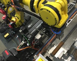 Cellule robotisée de manutention et palettisation de pièces mécaniques